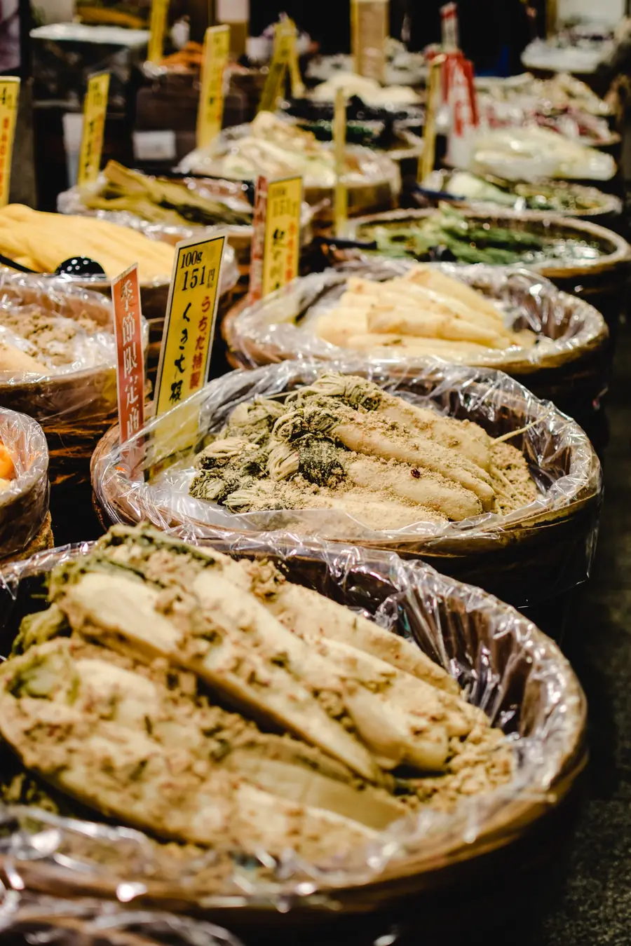 Baskets of pickled vegetables on display at Nishiki Market