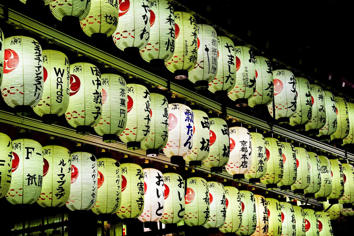 Rows of lit paper lanterns at Yasaka Shrine